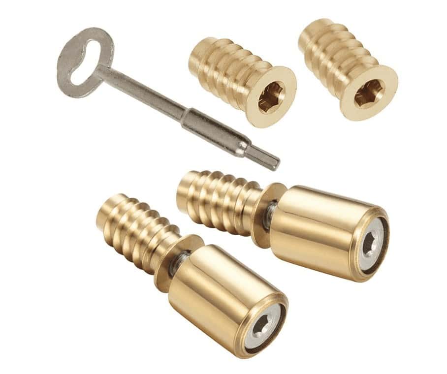 A set of brass screws and a key for Sash Window Restrictors.